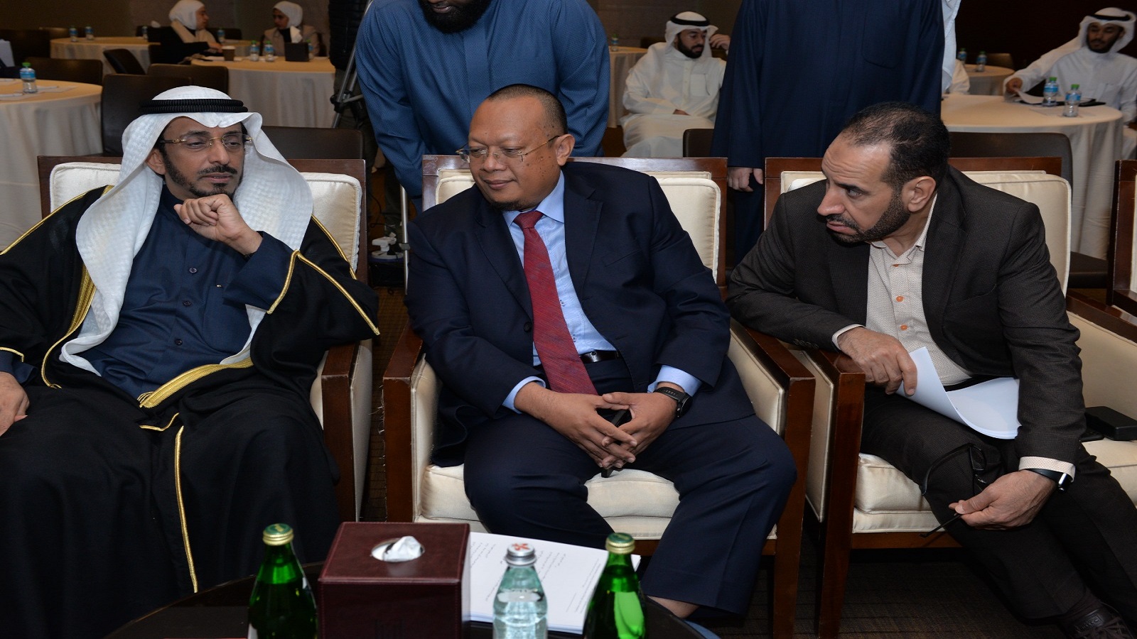 senior woman talking with staff